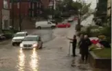  ?? SHAWN MICALLEF FOR THE TORONTO STAR ?? COSTLY WEATHER: Flooding in Toronto, after a torrential July downpour, caused havoc.