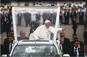  ??  ?? POPE FRANCIS waves as he leaves the Catholic shrine of Fatima in Portugal last week.