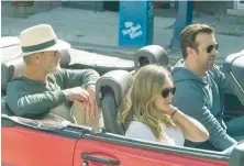  ??  ?? DEVELOPING STORY: Ed Harris, Elizabeth Olsen and Jason Sudeikis, from left, take a road trip to get film developed in ‘Kodachrome.’