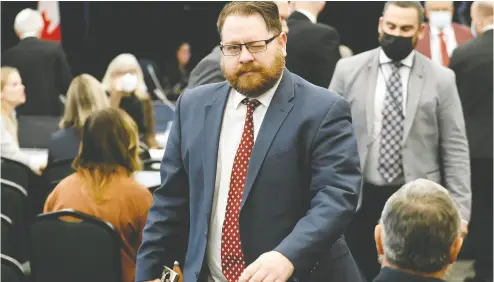  ?? BLAIR GABLE / REUTERS ?? Freedom Corp. lawyer Brendan Miller walks out of the Public Order Emergency Commission in Ottawa on Tuesday after being ordered to leave by Commission­er Paul Rouleau at the conclusion of a testy exchange between the two.
