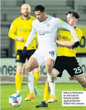  ??  ?? Marcus Mcguane on the ball for Oxford United against Burton Albion this season.