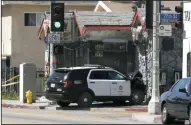  ?? CHRISTIAN K. LEE/LOS ANGELES TIMES ?? A police car was crashed in Los Angeles on June 15. Three juveniles are accused of stealing two police cruisers and leading officers on a chase that ended in a crash.