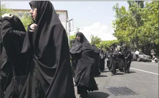  ?? Vahid Salemi / Associated Press ?? Worshipper­s leave at the conclusion of the Friday prayers in downtown Tehran, Iran, last week.