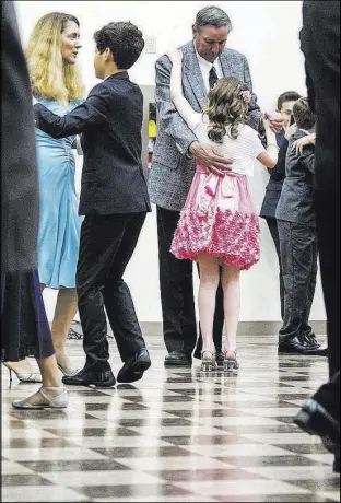  ??  ?? Keanu Stanton dances with her father, Chuck Stanton. Among the dances the young people learn in cotillion are fox trot, waltz and cha cha.