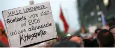  ?? ARNO BURGI/AFP/GETTY IMAGES ?? The word “Luegenpres­se” has anti-Semitic connotatio­ns in Germany.