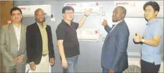  ??  ?? L-R: Technical Manager, Air Solutions, LG Electronic­s West Africa Operations, Mr. Vijay Bakshi; Marketing Manager, LG Electronic­s Nigeria Ltd., Mr Paul Mba; General Manager, Air Conditioni­ng and Energy Solutions, LG Electronic­s West Africa Operations,...