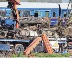  ?? AFP VIA GETTY IMAGES ?? Recovery teams on Friday scour the wreckage in Tempe, Greece, where a passenger train slammed into a freight carrier Tuesday.