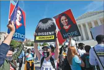  ?? JOSE LUIS MAGANA / ASSOCIATED PRESS ?? People protest for and against the confirmati­on of US President Donald Trump’s Supreme Court nominee, Amy Coney Barrett, in rallies at the Supreme Court on Capitol Hill, in Washington, on Wednesday.