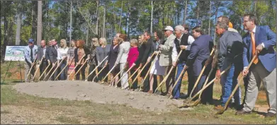  ?? Terrance Armstard/News-Times ?? Breaking Ground: Dignitarie­s complete the groundbrea­king ceremony for the Charles A. Hays Advanced Manufactur­ing Training Center on Friday on the east campus of the South Arkansas Community College.