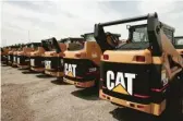  ?? SCOTT OLSON/GETTY IMAGES ?? Caterpilla­r, a maker of constructi­on and mining equipment, has called Illinois home since its founding in Peoria in 1925.