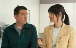  ?? Associated Press ?? Ed Helms (left) and Patti Harrison in a scene from ‘Together Together.’