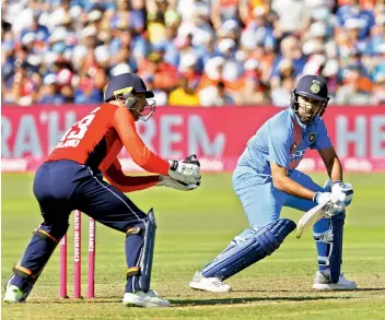  ?? AFP ?? Rohit Sharma en route to his unbeaten 100 in the third Twenty20 match against England at the Brightside ground in Bristol on Sunday. India won by seven wickets. —