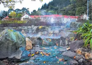  ??  ?? Clockwise from above: Steam rises from the stream at Te Aroha Mineral Spas; Waikato’s rich, verdant farmland; the Alpino restaurant once housed in Cambridge’s original post office; the Hauraki Rail Trail is 197km of fairly easy cycling.