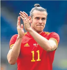  ??  ?? Gareth Bale leads Wales against the Swiss today.