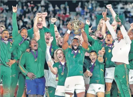  ?? GETTY ?? Siya Kolisi became South Africa’s first black captain to lift the Web Ellis Cup following the 32-12 win over England in the Rugby World Cup final at Yokohama on Saturday.