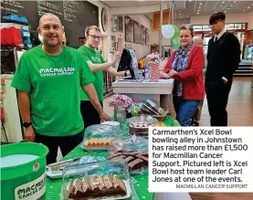  ?? MACMILLAN CANCER SUPPORT ?? Carmarthen’s Xcel Bowl bowling alley in Johnstown has raised more than £1,500 for Macmillan Cancer Support. Pictured left is Xcel Bowl host team leader Carl Jones at one of the events.