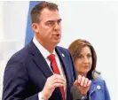  ?? DOUG HOKE/THE OKLAHOMAN ?? Gov. Kevin Stitt, left, and Joy Hofmeister may face off in next year’s governor’s race.