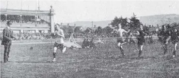  ??  ?? J. K. Davidson (University) wins the Rugby footballer­s’ 110yards footballca­rrying championsh­ip at the Dunedin Amateur Atrhletic Associatio­n’s sports on the Caledonian Ground on October 9. — Otago Witness, 19.10.1920.
COPIES OF PICTURE AVAILABLE FROM ODT FRONT OFFICE, LOWER STUART ST, OR WWW.OTAGOIMAGE­S.CO.NZ