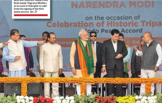  ?? ANUPAM NATH ?? PEACEMAKER­S PM Narendra Modi with state BJP leaders and Bodo leader Hagrama Mohilary at an event in Kokrajhar to celebrate the signing of the third peace accord, Jan. 27