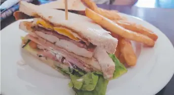  ??  ?? Classic club sandwich at Finlay’s Joint Cafe