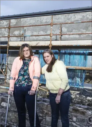  ??  ?? Aoibheann and Mairead Mitchell outside what will be their new home in Knocknarea