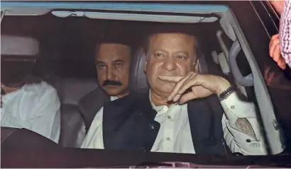  ?? AFP ?? Nawaz Sharif leaves the Kot Lakpat jail in Lahore after his release late on Tuesday night. —