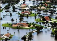  ?? THE PALM
BEACH POST 2012 ?? Tropical Storm Isaac flooded parts of Wellington in 2012. New flood maps could bring significan­t increases to the cost of insuring homes, many in western and central county areas.