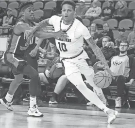  ?? SENTINEL EBONY COX / MILWAUKEE JOURNAL ?? BJ Freeman, shown here earlier this season, scored the second-most points in a game by a UWM player against Stetson on Sunday.