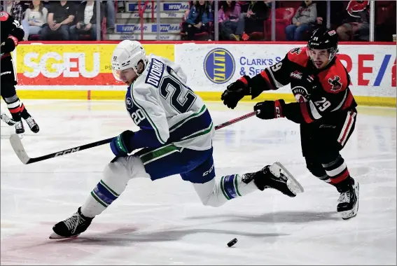  ?? NICK PETTIGREW/MOOSE JAW WARRIORS HOCKEY CLUB ?? Swift Current Broncos defenseman Jakub Dvorak (left) tried to turn away from the pursuit of Moose Jaw Warriors forward Brayden Yager during game two on Saturday.