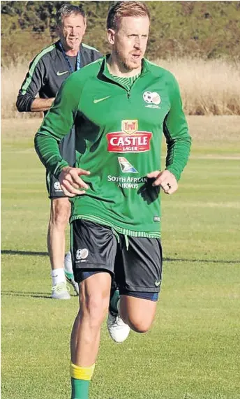  ?? / SUPPLIED ?? Michael Morton trains under the watchful eye of coach Stuart Baxter.