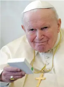  ?? VATICAN POOL/ GETTY IMAGES FILES ?? A new musical is being based on the life of John Paul II. He will be portrayed by three actors and a hologram in the show.