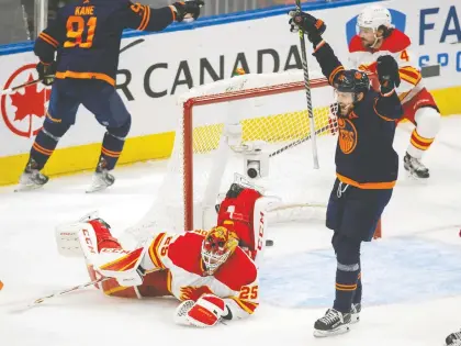  ?? GREG SOUTHAM ?? The Oilers' Leon Draisaitl celebrates a goal by Evander Kane on Flames goaltender Jacob Markstrom during Game 3 of their series Sunday at Rogers Place. Game 4 goes Tuesday, with the Oilers getting a chance to take a 3-1 strangleho­ld in the best-of-seven series.