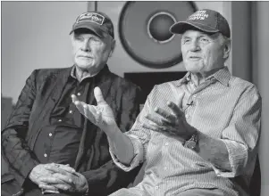  ?? AP PHOTO ?? In this photo taken on Wednesday, June 13, 2018, Beach Boys musicians Mike Love, left, and Bruce Johnston, right, during an interview with Associated Press at Spiritland in London. The Beach Boys have a new CD with the Royal Philharmon­ic Orchestra that gives a classical twist to their sunny 1960s hits.