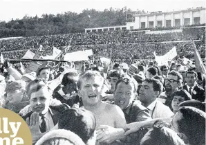  ??  ?? Billy & me HUGH KEEVINS JOURNALIST EURO STAR McNeill mobbed on the Lisbon pitch after victory