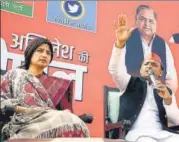  ?? PTI ?? SP chief Akhilesh Yadav addresses a 'Chaupal' (public meeting) with his wife and Kannauj MP Dimple Yadav on Friday.