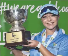  ??  ?? Jessie Cottell with her Australian Open trophy.