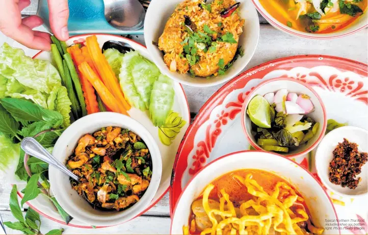  ??  ?? Typical Northern Thai food, including khao soi, bottom right. Photo / Getty Images