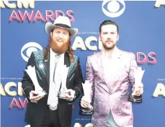  ?? — AFP file photo ?? John (left) and T.J. of Brothers Osborne attend the 53rd Academy of Country Music Awards recently in Las Vegas, Nevada.