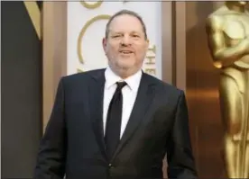  ?? PHOTO BY JORDAN STRAUSS — INVISION — AP, FILE ?? In this file photo, Harvey Weinstein arrives at the Oscars in Los Angeles.