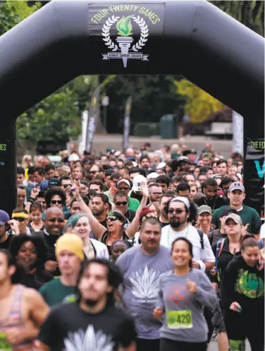  ?? Photos by Michael Macor / The Chronicle ?? The running competitio­n gets under way during the third annual 420 Games in Golden Gate Park in San Francisco. The event seeks to change the misconcept­ion that cannabis users are unmotivate­d and lazy.