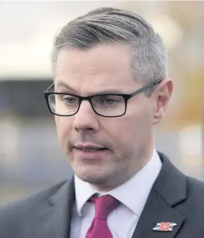  ??  ?? Budget seal of approval Finance Secretary Derek Mackay