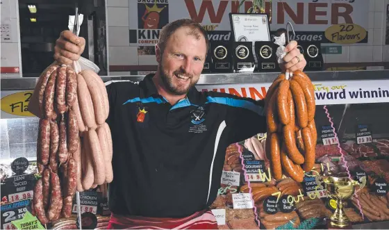  ??  ?? Andrew Loveday won the pork, lamb, poultry, continenta­l and gourmet categories in the Regional Sausage King Competitio­n. Picture: STEVE HOLLAND