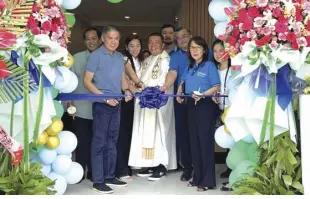  ?? ?? Eternal Chapels Chairman and CEO, D. Edgard a. Cabangon, along with rev. Fr. Fermin tan and Eternal Chapels treasurer, D. antoinette C. Cabangon-jacinto, lead the ribbon-cutting ceremony for the new Eternal Chapels in Divisoria Plaza, Cagayan de Oro. they are joined in the photo by Eternal Chapels Vice Chairman Benjamin V. ramos, VP for Sales Jose antonio V. rivera, Branch Manager amor S. leodones, atty. adrian C. Barba, and Ms. Sharon tan.