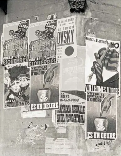  ?? // J. BRANGULÍ ?? Propaganda electoral en las fachadas de las calles de Barcelona en febrero del 1936