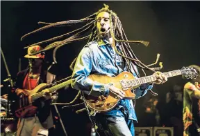  ??  ?? Julian Marley in action on stage.