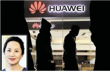  ?? AP0BILDER: NG HAN GUAN ?? Die Finanzvors­tändin des chinesisch­en Smartphone­hersteller­s Huawei, Meng Wanzhou (kleines Bild), wurde in Kanada festgenomm­en.