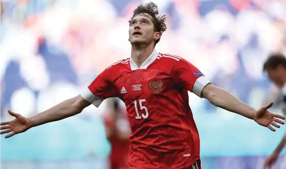  ??  ?? Russia's Aleksei Miranchuk celebrates after scoring the opening goal during the Euro 2020 soccer championsh­ip group B match between Finland and Russia at the Gazprom Arena stadium in St. Petersburg, Russia, Wednesday, June 16, 2021. (AP Photo/Kirill Kudryavtse­v, Pool)