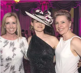  ??  ?? Dr. Julie Thomson, from left, Lesley-Anne Wilkinson and Amanda Cain were elegant and theme-appropriat­e in their black and white party fashions.