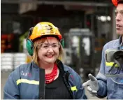  ??  ?? FROM TOP: With Labour leader Jacinda Ardern at Christchur­ch’s Addington Primary School in 2017; Megan loves the people side of politics; she’s often out and about in a hard hat in her Housing Minister role.