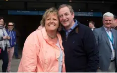  ??  ?? THE BOSS: Taoiseach Enda Kenny with his wife Fionnuala at Bruce Springstee­n’s Croke Park gig. Photo: Arthur Carron